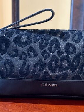 Rare Coach Ocelot back shimmer duffel shaped wristlet